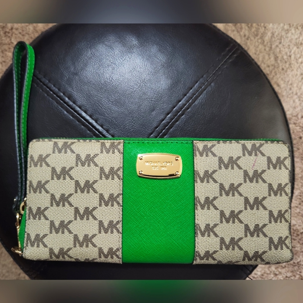 Michael Kors Wristlet Wallet.Lots of card slots & zip compartments.Brand New